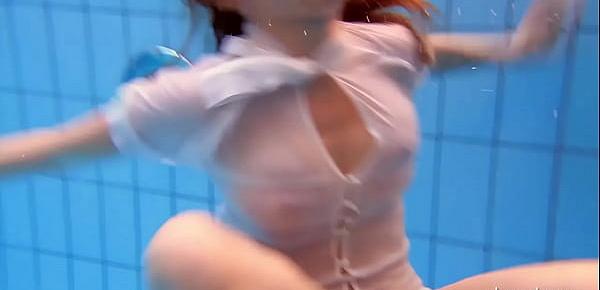  Big tits brunette babe Zuzanna swimming in the pool
